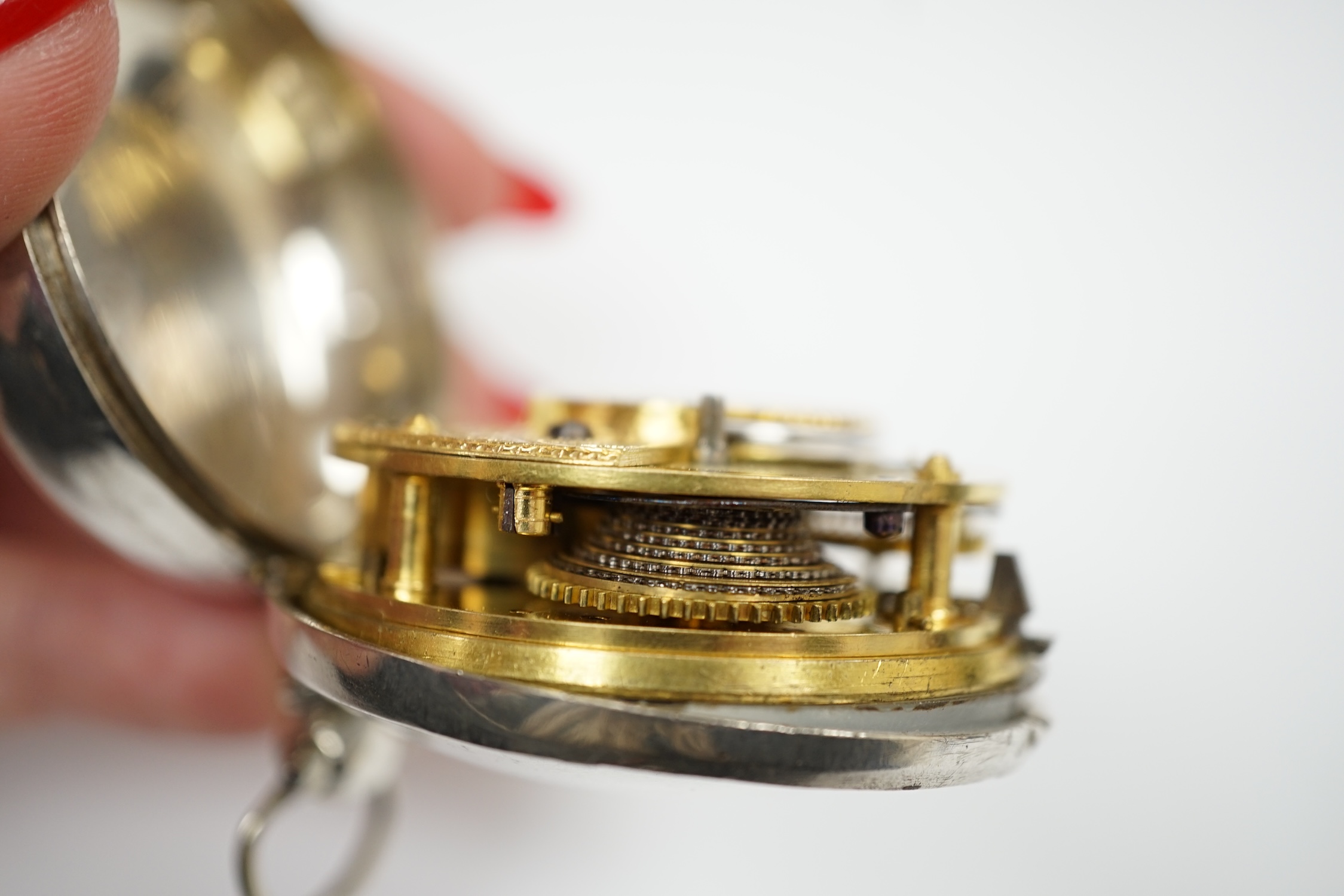 A George III silver pair cased keywind verge pocket watch, by W, Atwood of Lewes, with Roman dial and signed movement numbered 4644, outer case diameter 56mm.